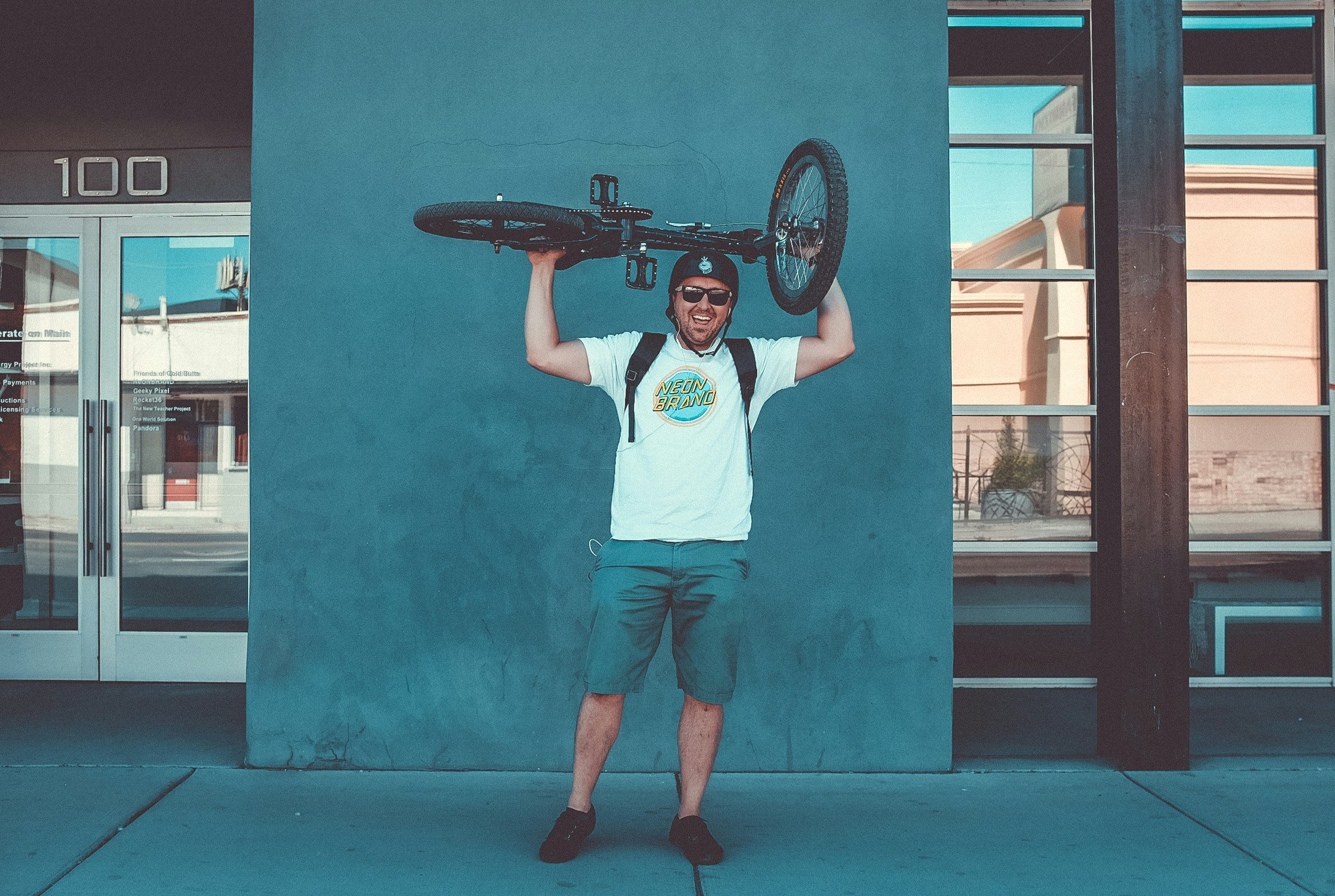 men's white crew-neck t-shirt and blue shorts